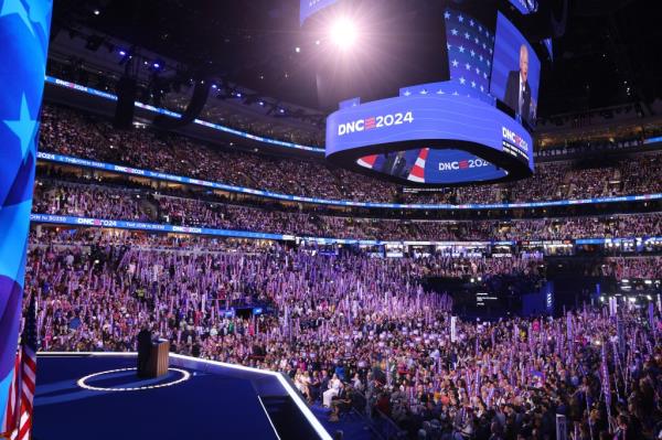 U.S. Democratic vice presidential nominee Minnesota Governor Tim Walz takes the stage on Day 3 of the Democratic National Convention (DNC) at the United Center, in Chicago, Illinois.