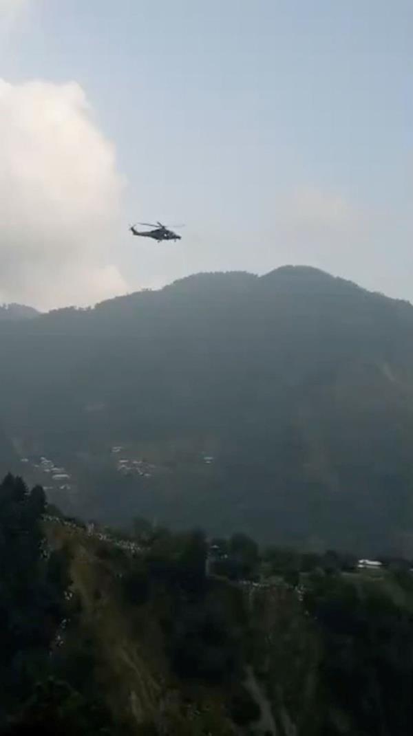 Two children pulled from Pakistan cable car but helicopter rescue called off as night falls