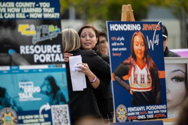 Regina Leah Chavez, mother of Jewels Marie Wolf, is comforted during a press conference after the sentencing Tuesday, Oct. 10, 2023 at Placer Superior Court in Roseville of Nathanial Evan Cabacungan, 22, for second-degree murder for the fentanyl death of her daughter. Cabacungan, 22, was sentenced to 15 years to life in prison in what is believed to be the first California murder conviction for a fentanyl death.