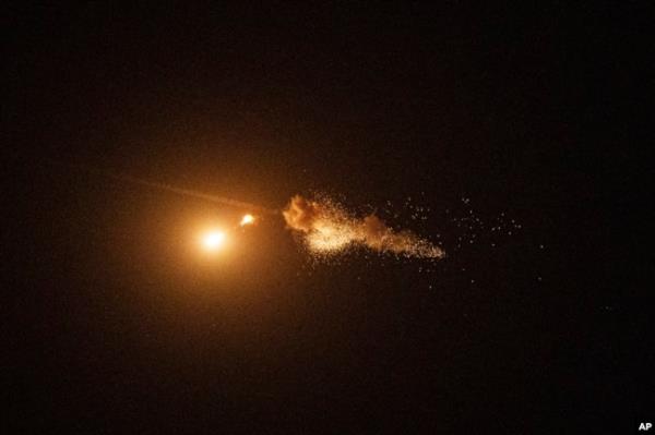 Ukrainian air defense intercepts a Shahed drone mid-air during a Russia aerial attack on the capital in Kyiv, Ukraine, Sept. 7, 2024.