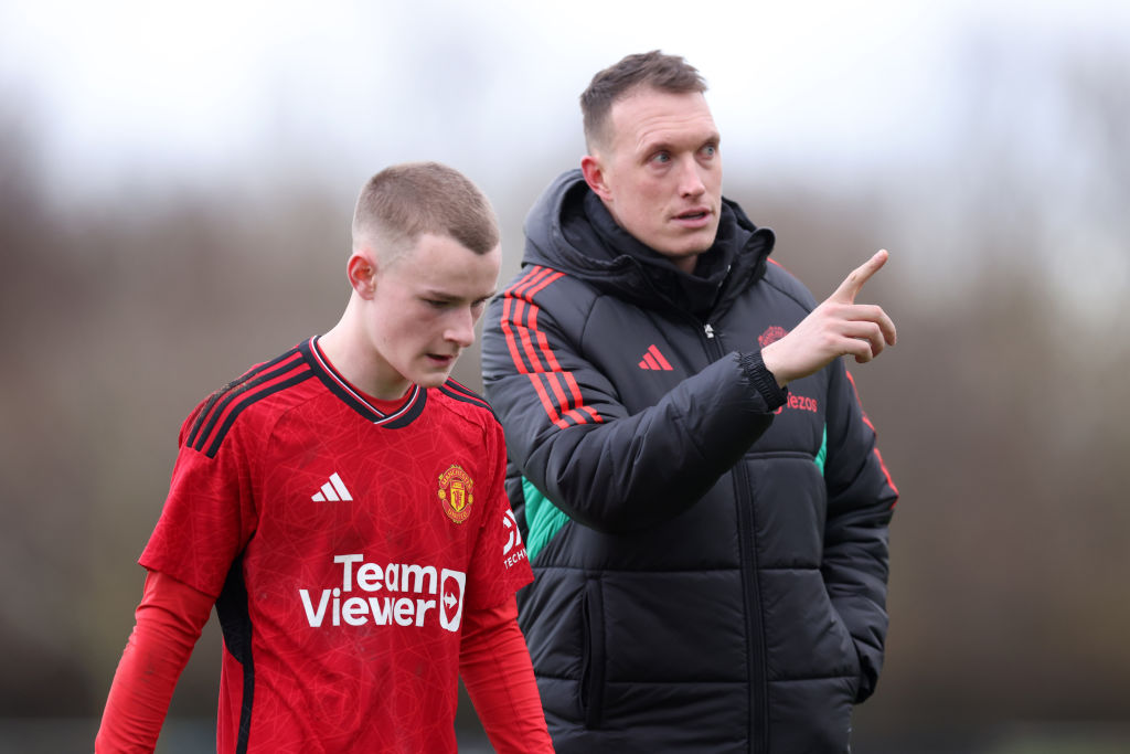 Phil Jones, Coach of Manchester United U18 speaks with Ashton Missin of Manchester United U18 during the U18 Premier League match between Newcastle United U18 and Manchester United U18